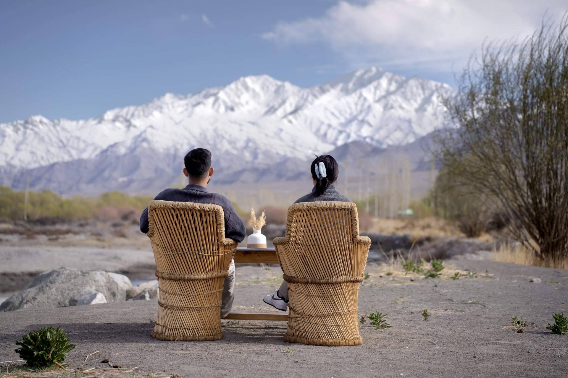 Couple Sitting by the Riverside